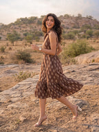 Brown Ikat Print Sleeveless Belted Midi Dress - Smiling side profile
