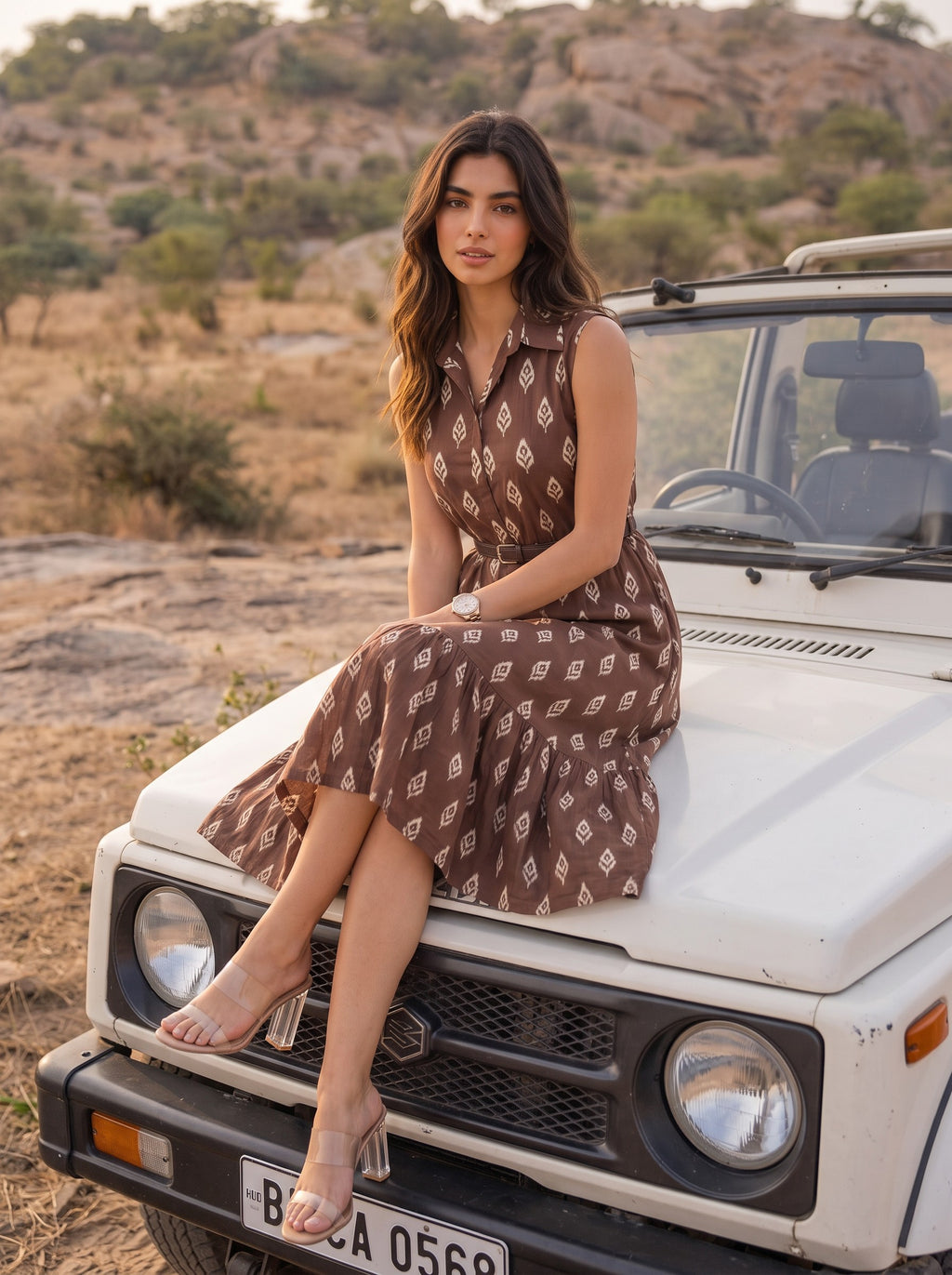 Brown Ikat Print Sleeveless Belted Midi Dress - Seated on Gypsy jeep