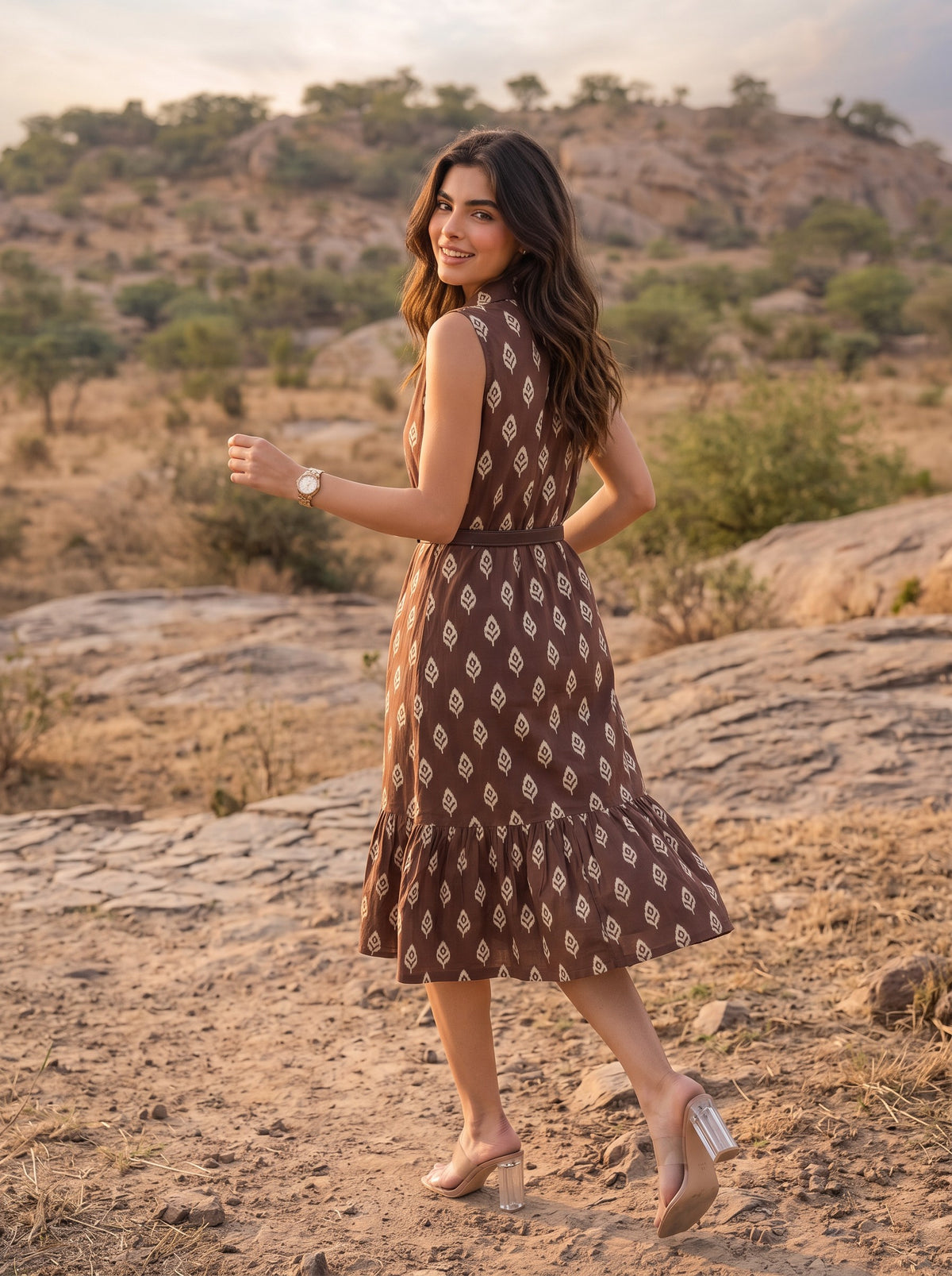 Brown Ikat Print Sleeveless Belted Midi Dress - Walking on rocks smiling