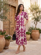 Magenta Cream Bold Geometric Print Collared Puff Sleeve Midi Dress - Leaning on teal door with chain bag